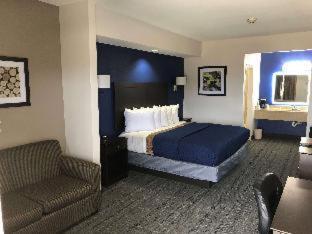 Executive Inn y Suites Joaquín Habitación foto